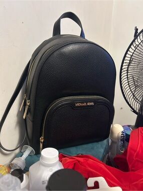 Michael Kors Black Pebbled Leather Mini Backpack with Gold-Tone Hardware